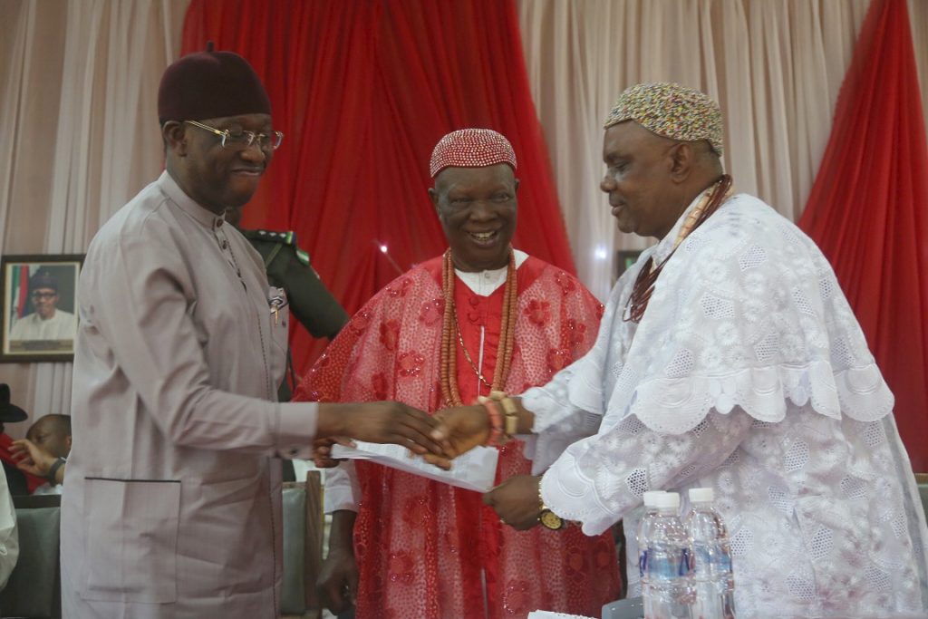 Delta State Governor, Senator Ifeanyi Okowa (left); receiving a letter of address from, His Royal Majesty Emmanuel Efeizomor II, Obi of Owa (middle) and His Royal Majesty, Jonathan Kanegede I, Ogene of Ibedeni, during a Meeting by the Governor on Traditional Rulers, at Owa Oyibu Delta State.