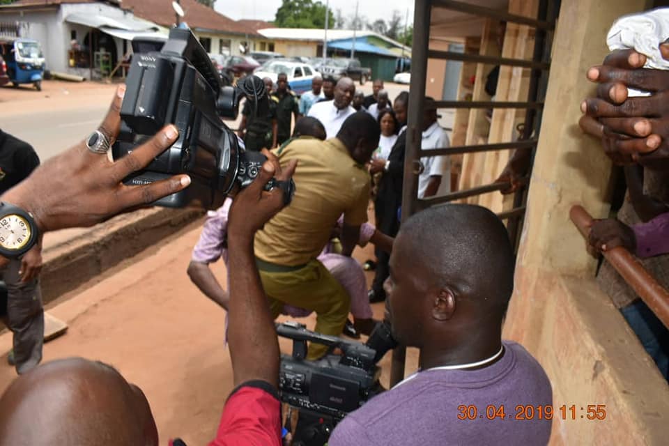 Ojokojo Robinson Obajero, the 63 years old ritual herbalist suspect in Elozino Murder case being carried into the court room