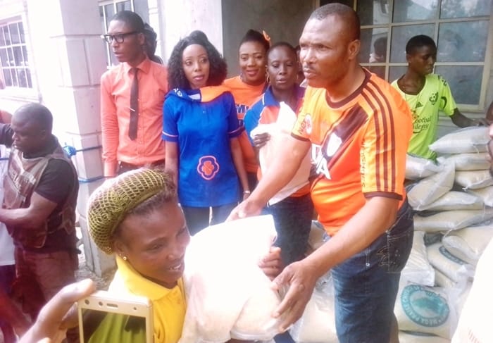 Hon. Mike Diden, Member Representing Warri North State Constituency in the Delta State House of Assembly, Distributing 2017 Christmas Rice and Other Food Items to Deltans at his Residence in Sapele.