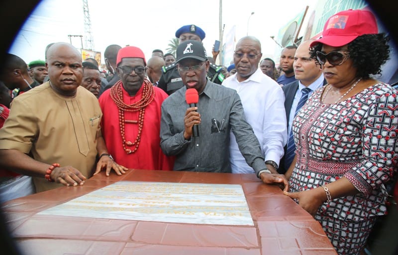 Delta State Governor, Senator Ifeanyi (3rd left) his Deputy, Barr. Kingsley Otuaro (3rd right), member, representing Ethiope East LGA in the State House of Assembly, Hon Evance Evwurie (left), HRM Akpomeyoma Majoroh, Ojeta ii, the Ovie of Orarivie- Abraka Kingdom, Commissioner for Commerce and Industry, Barr. Mary Iyase and others during the Commissioning of Abraka township road, Abraka .