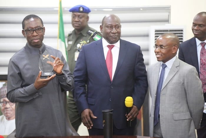 Delta State Governor, Senator Ifeanyi Okowa (left); Chairman, Guinness Nigeria PLC, Tunde Savage (middle) and Managing Director Guinness Nigeria PLC, Peter Ndegwa, during a courtesy call on the Governor, by the Chairman and Management of Guinness Nigeria PLC, in Government House Annex Warri, Delta State.