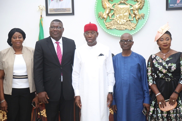 Delta State Governor, Senator Ifeanyi Okowa (middle); Mr. and Mrs. Tony Obuh (right); Mr. and Mrs. Lawson Efenudu, during the Swearing-in of Chairman and Secretary, Delta State Pension Bureau, in Government House Asaba.