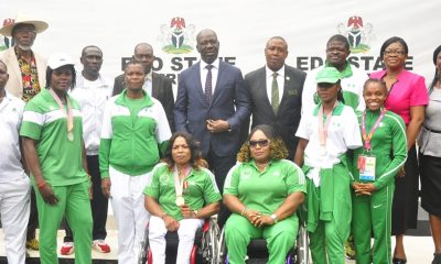 Edo State Governor, Mr. Godwin Obaseki (4th left, back row); Special Adviser to the Governor on Special Duties, Yakubu Gowon (4th right, back row), with coaches and athletes of Edo State origin, who represented the country at the 2018 Commonwealth Games in Australia, after a courtesy visit to the governor, at the Government House, Benin City, on Tuesday, July 17, 2018.