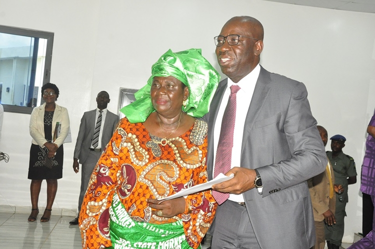 Edo State Governor, Mr. Godwin Obaseki (right), with the Market Women Association leader, Madam Blackie Ogiamien, during a courtesy visit by traders to the governor at the Government House, in Benin City, Edo State, on Monday, July 23, 2018.