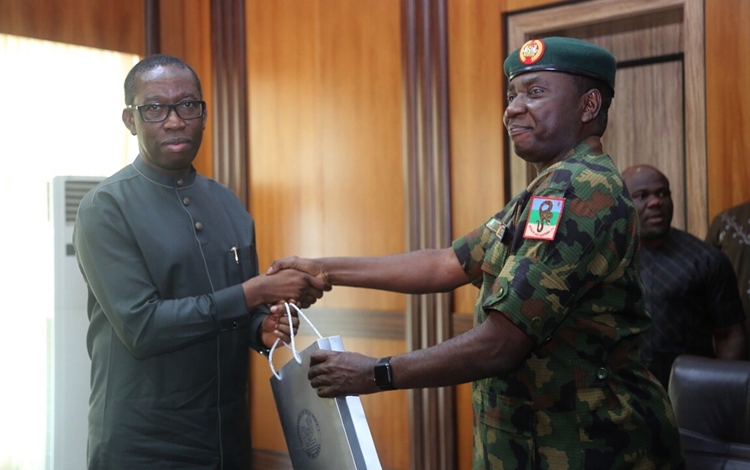 Delta State Governor, Senator Ifeanyi Okowa (left) and GOC 6 Division Nigerian Army, Major General Jamil Sarham, during a courtesy call on the Governor, in Government House Asaba.