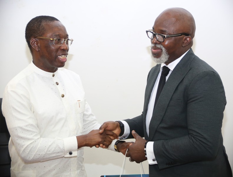 Delta State Governor, Senator Ifeanyi Okowa (left), and the President, Nigeria Football Federation (NFF), Mr Amaju Pinnick during a courtesy call by the later on the Governor in his office in Asaba.