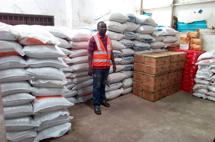 Relief materials being distributed to flood victims by officials of the Edo State Emergency Management Agency in Benin City.