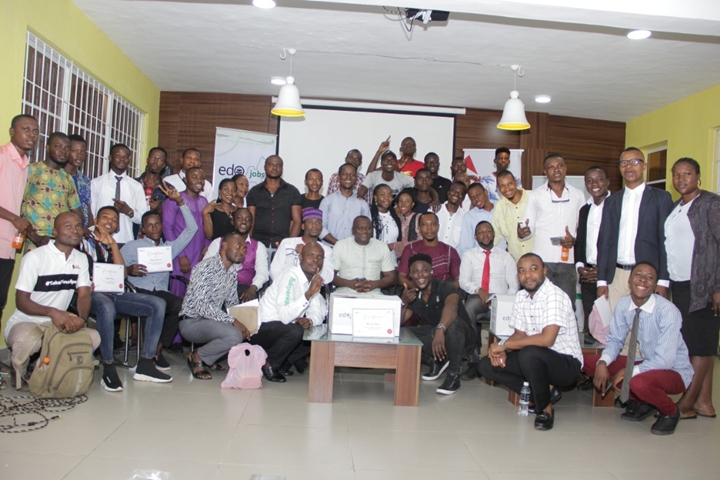 Cross-section of graduands with facilitators during the graduation ceremony of 89 youths, from the training programme organised by EdoJobs in partnership with SLOT Foundation, at the Edo Innovation Hub, Benin City.