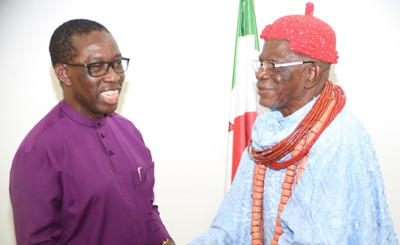Delta State Governor, Senator Ifeanyi Okowa (left), and the Igwe of Okpai, HRM Ugbomah Enebeli Golding ll (right), during a courtesy call by the later on the Governor in Asaba.