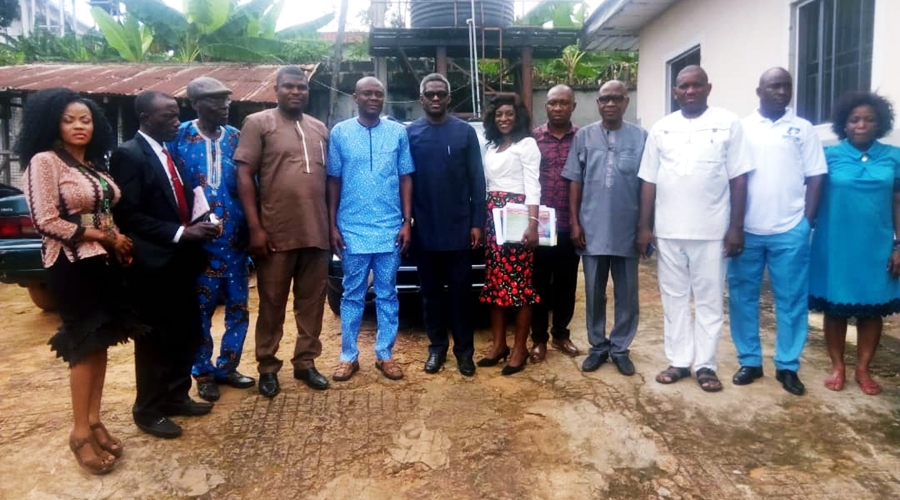 Dr. Ben Nkechika, Director General of the Delta State Contributory Health Insurance Scheme (middle) Flanked by Community Newspaper Publishers in Delta State