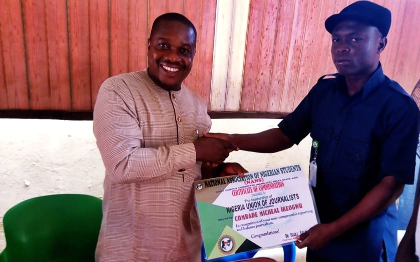 L-R: Comrade Michael Ikeogwu, Chairman, NUJ Delta State Council and Comrade Dio Oghale Emeka Rex, Chairman, Delta State NANS/JCC