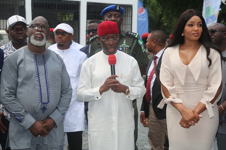 Delta State Governor, Senator Ifeanyi Okowa (middle); President of Nigeria Football Federation, Mr. Amaju Pinnick (left) and his wife, Mrs. Julie, during the Commissioning of Brown Hill Event Centre, at ELF Road Ogunu, Warri Delta State.