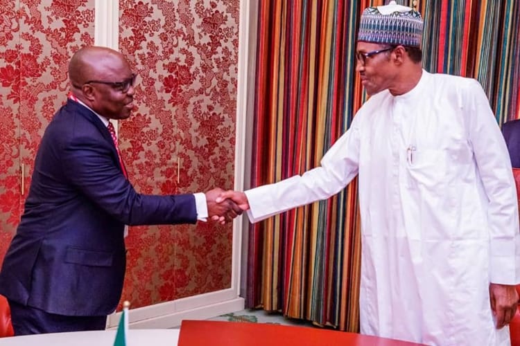 Dr. Emmanuel Uduaghan during a Visit to President Muhammadu Buhari at Aso Rock Villa