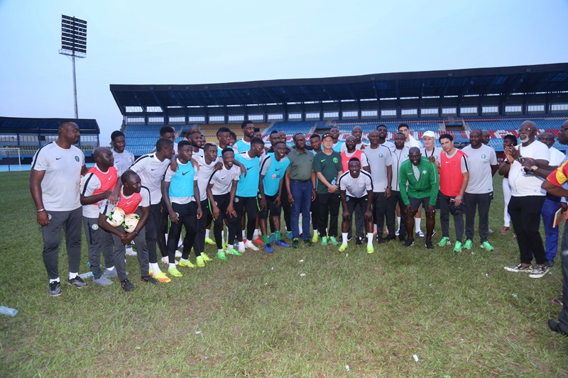 Governor Okowa in a Group Photograph with Officials and Players of Super Eagles during the Inspection of their Training Camp, at Stephen Keshi Stadium, Asaba.