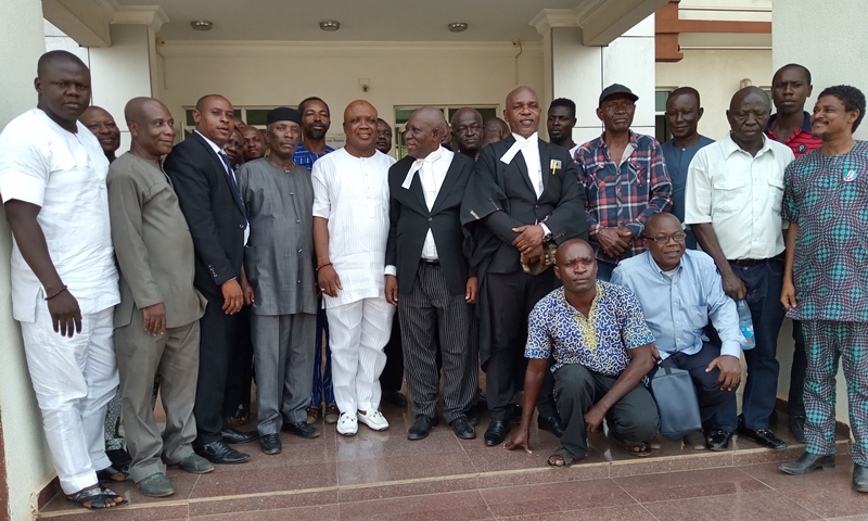 Chief Cyril Ogodo (Middle) Flanked By His Legal Team and Party Loyalists At The Federal High Court Asaba