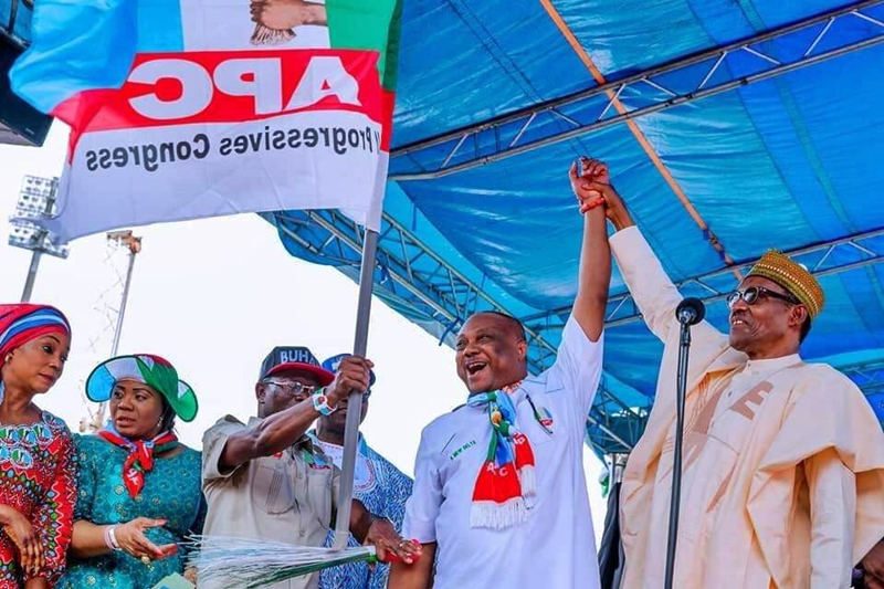 Chief Great Ogboru Receiving the Delta State APC gubernatorial Flag During the APC Presidential Campaign Rally in Warri