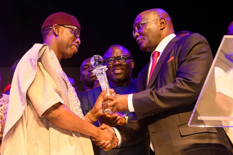 PDP Presidential Candidate, Alhaji Atiku Abubakar (right) presenting the 2018 Silverbird Man of the Year Award to Delta State Governor, Senator Ifeanyi Okowa, at 2018 Man of the Year Awards.