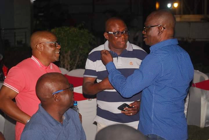 Comrade Ovuozourie Macaulay (right) Celebrates Okowa's Victory with a Party