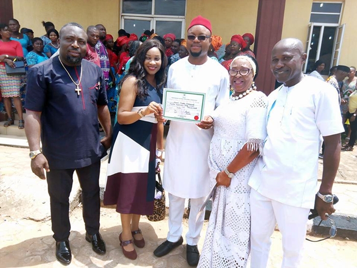 Hon Emeka Nwaobi (middle) flanked by spouse and Aniocha North PDP Leaders after receiving his INEC Certificate of return