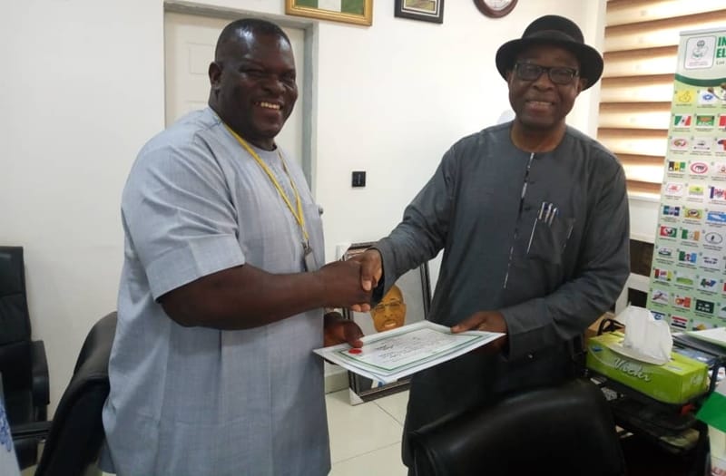 The Ukwuani State House Constituency Elect to the Delta Assembly, Hon Christopher Ochor Ochor, Receiving His Certificate of Return from the INEC Federal Commissioner, in Charge of Delta, Cross River and Akwa Ibom, Mr Mohammed Lecky, at the INEC Headquarters Abuja.