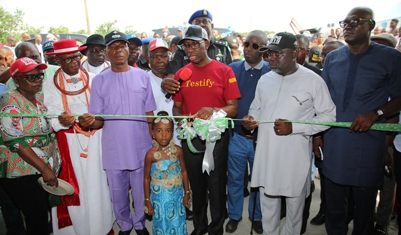 Delta State Governor, Senator Ifeanyi Okowa (4th right); Delta state PDP Chairman, Barr. Kingsley Esiso (right); Senator James Manager (3rd left); Commissioner for Women Affairs, Rev. Mrs. Omatshola Williams (left); Chief Brown Mene (2nd left); Chairman, Governing Board DESOPADEC, Hon. Godwin Ebosa (3rd right); Chairman, Warri North Local Government Area, Adoge Okorodudu (2nd right) and Others, during the Commissioning of Concrete Jetty with a Roof/Shore Protection.