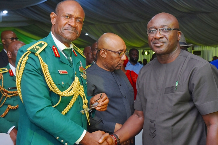 Representative of Delta State Governor, the Honourable Commissioner for Information, Chief Patrick Ukah in a warm handshake with the Representative of the Chief of Army Staff, Maj Gen Martins Enendu at the Service of Songs and Night of Tributes for late Maj Gen (Olorogun) David Ejoor (Rtd), GCON, OFR on Monday, April 29, 2019 in Lagos.