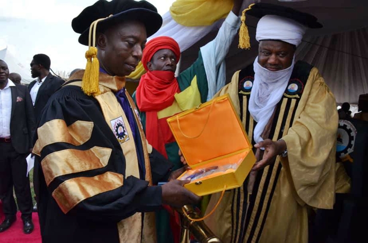 Ned Nwoko (left) Receives Doctorate Award From FUPRE