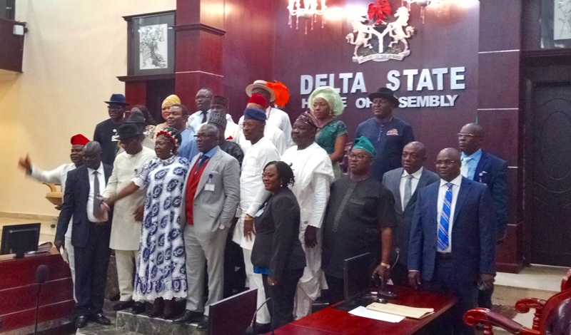 Speaker Sheriff Oborevwori flanked by Lawmakers of the Sixth Assembly of the Delta State House of Assembly