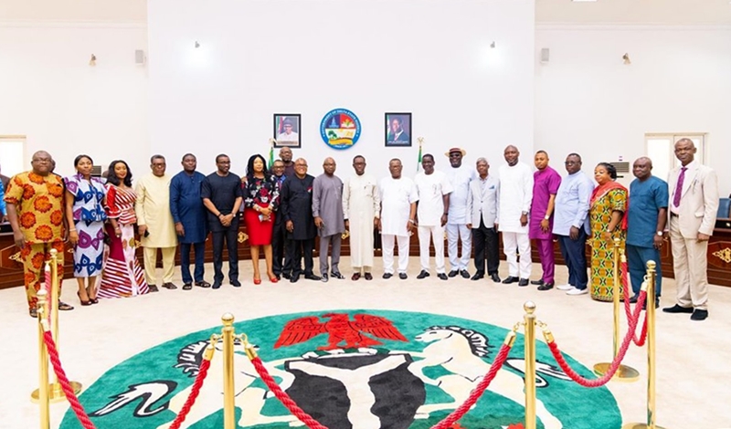 Delta State Governor, Senator Ifeanyi Okowa flanked by members of the Transition Committee for his Second Tern in Office