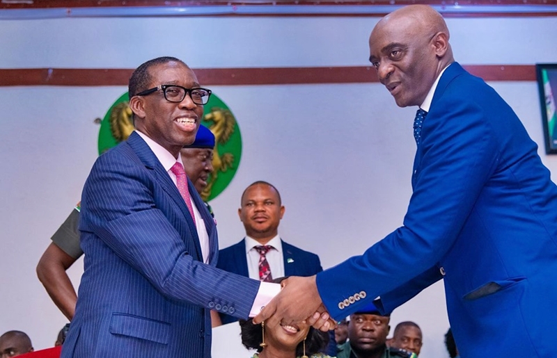Delta State Governor, Senator (Dr) Ifeanyi Okowa (left), congratulating Barr. Chiedu Ebie, after swearing him in as the new Secretary to Government in Asaba.