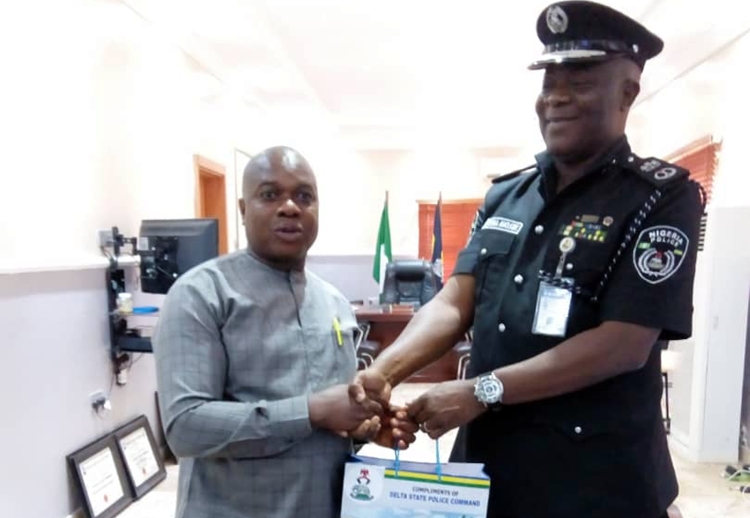 Delta NUJ Chairman, Michael Ikeogwu and CP Adeyinka Adeleke, Commissioner of Police, Delta State.