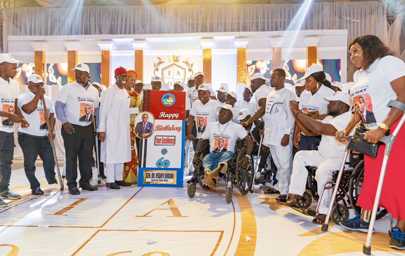 Delta State Governor, Senator  Ifeanyi Okowa and his wife, Dame Edith flanked by Physically Challenged Persons during Governor Okowa 60th Birthday Reception, held at Event Center, Asaba.