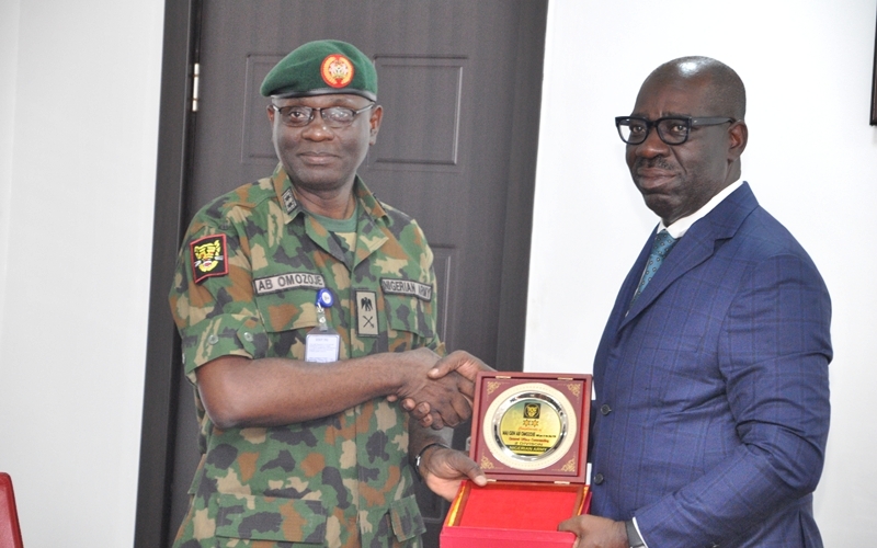 Edo State Governor, Mr. Godwin Obaseki (right) and General Officer Commanding, 2 Division, Nigerian Army; Major-General Anthony Bamidele Omozoje (left) during a courtesy visit to Governor Obaseki at the Government House, Benin City, the Edo State capital, on Wednesday, August 14, 2019.