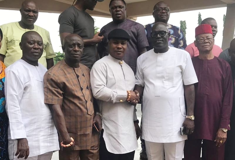 Delta State PDP Chairman, Olorogun Kingsley Esiso (2nd right) in a Handshake with Chief Julius Takeme at the PDP State Secretariat Asaba..