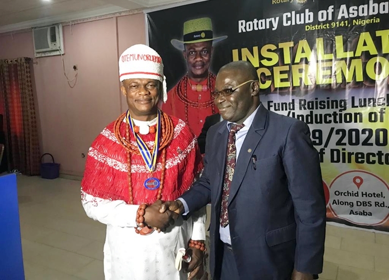 Installation of Rotarian Aweka Avwenaghagha as first President of the Rotary Club of Asaba Gateway