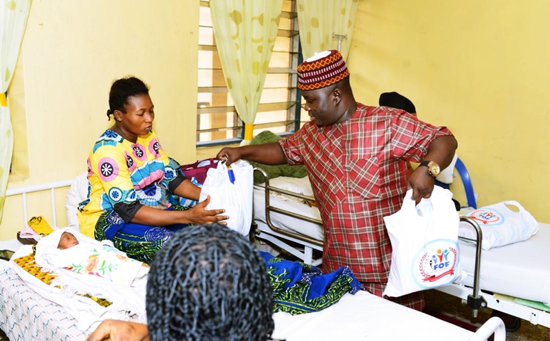 Osanebi's Birthday: Mr Prayer Pemu a.k.a Mc Orange, distributing Gifts Items to Patients