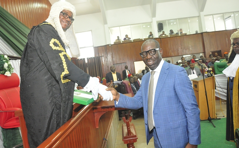Edo State Governor, Mr. Godwin Obaseki (right) presenting the 2020 budget proposal to the Speaker, Edo State House of Assembly, Rt. Hon. Frank Okiye, at the Assembly Complex in Benin City, on Wednesday, November 13, 2019.
