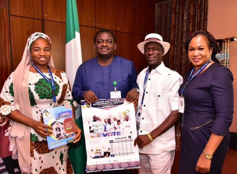 CEPEJ Team in a group photograph with Mr. Femi Adesina.
