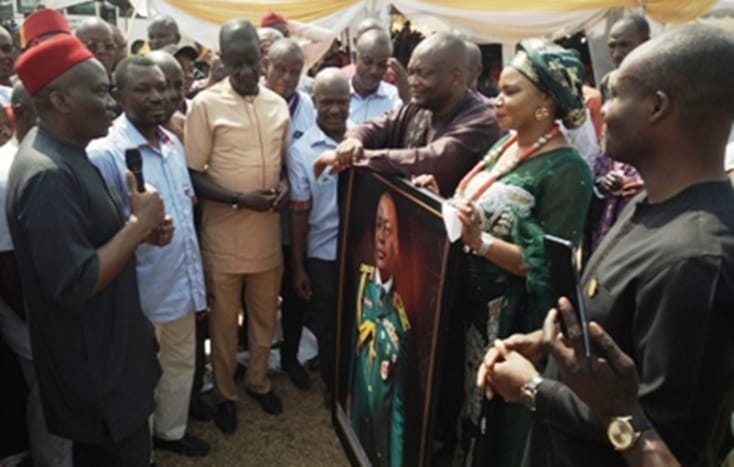 Reps Minority Leader, Elumelu addressing Major General Lawrence Fejokwu during a Reception in honour of his Elevation at Onicha Ugbo, Aniocha North LGA, Delta State