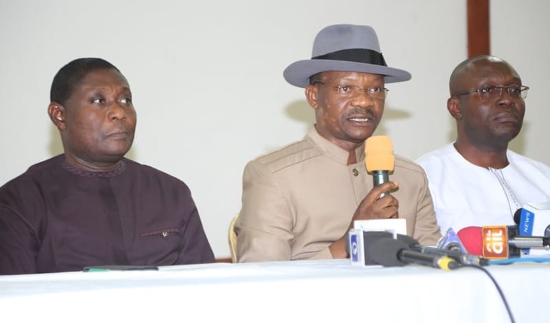 Delta State Commissioner for Information, Mr Charles Aniagwu (middle), addressing Journalists shortly after the State weekly EXCO meeting held in Government House Asaba. With him are the Commissioners for Works, Chief James Augoye (left), and his Youth Development counterpart, Mr Ifeanyi Egwunyenga (right) on Tuesday, January 21, 2020.