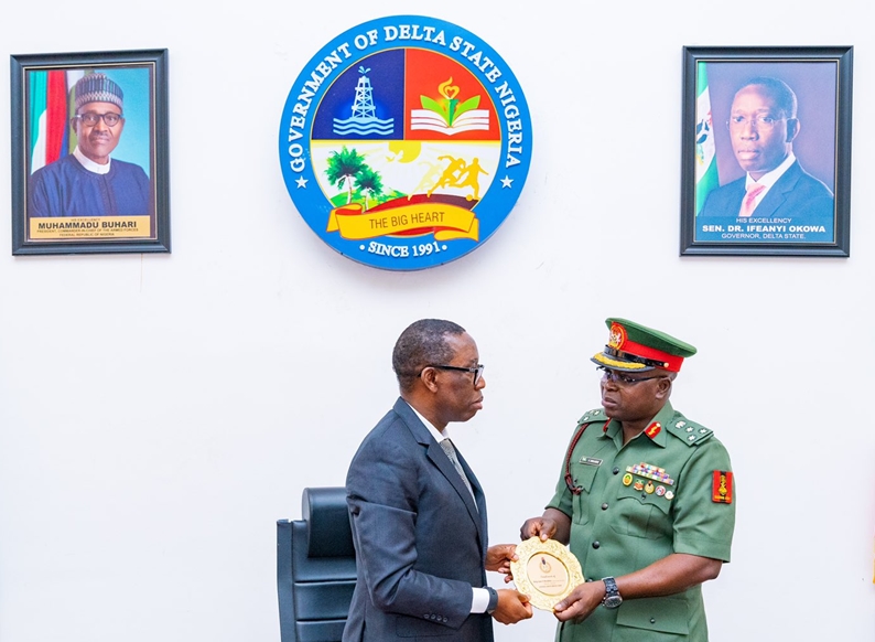 Delta State Governor ,Senator Dr Ifeanyi Okowa (left),receiving a plague from the Director General, NYSC Brigadier.General Shuaibu Ibrahim during a courtesy call by the latter in Government House, Asaba. Wednesday, February 5, 2020