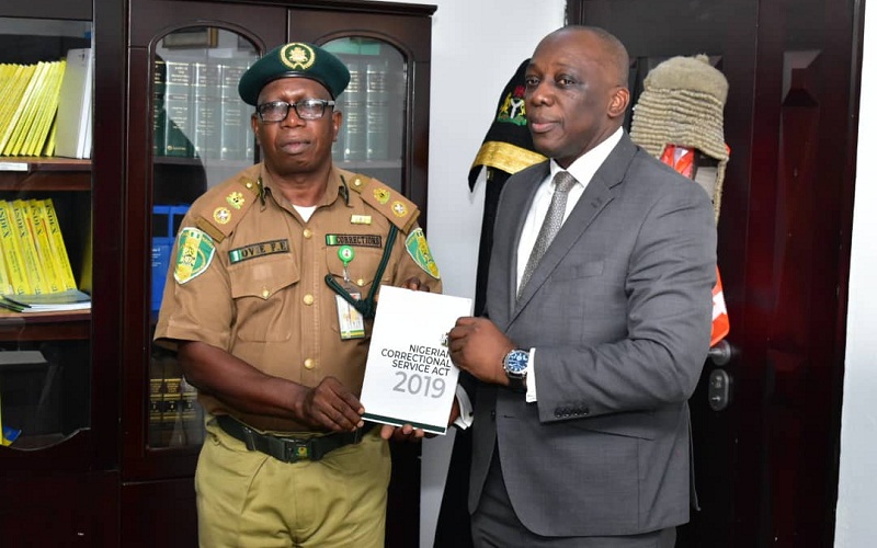 R-L: Delta State Attorney-General and Commissioner for Justice, Mr. Peter Mrakpor and Controller of the Nigerian Correctional Service, Delta State Command, Mr. Ovie Esezobor
