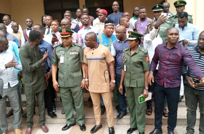 Brig. Gen. Emmanuel Akpan flanked by Delta Youths after the recruitment sensitization in Delta State at Government House Asaba.