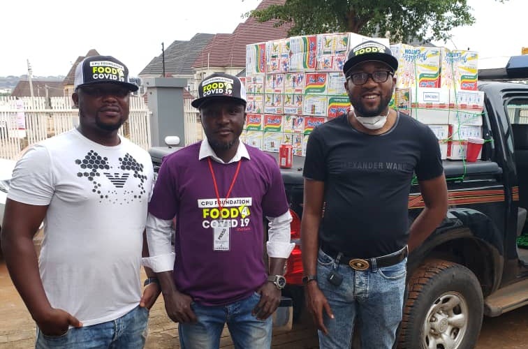 Chairman CPU Foundation, Engr. Philip Ugbomah Chukwumah (right) and Some Team Members during the Food 4 Covid-19 distribution exercise in Ndokwa East LGA
