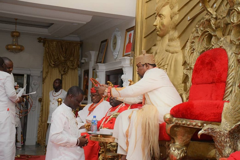 His Royal Majesty, Oboro Gbaraun II, Pere of Gbaramatu Kingdom Conferring Ibe-Sorimowei of Gbaramatu Kingdom on Comrade Sheriff Mulade