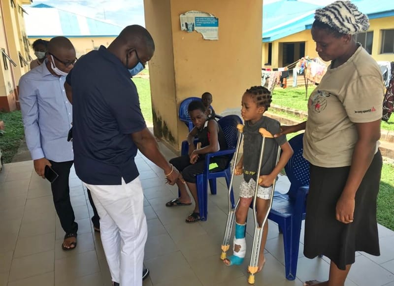 Hon Festus Okoh (left) with Little Miss Glory Roland at the Children Ward in FMC Asaba before her discharge.