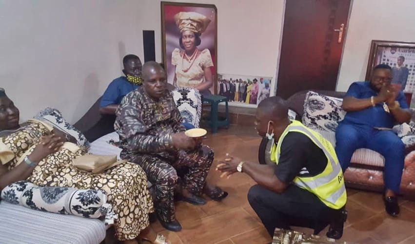 Frank Nujimen (Kneeling Down) Declaring His Intention to Party Leaders in Sapele