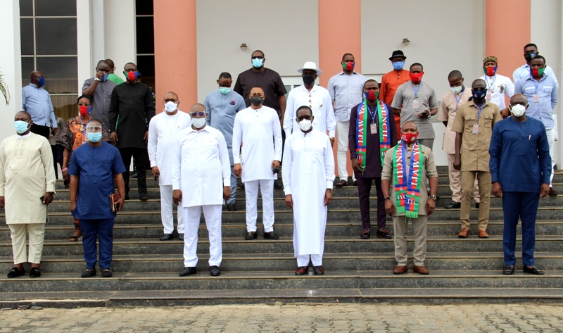 Delta Governor, Senator Ifeanyi Okowa (3rd right), Deputy Governor, Barr. Kingsley Otuaro (3rd left), Member representing Patani Constituency (DTHA), Hon Emmanuel Sinebe (1st left), Secretary to Delta State Government , Barr. Chiedu Ebie (1st right), and other members of the State Executive Council with the new Executives of Ijaw Youth Council (IYC) led by its President, Comrade Peter Timothy Igbifa (2nd right), during a courtesy visit to the Governor by the group in Asaba on Friday, August 14, 2020