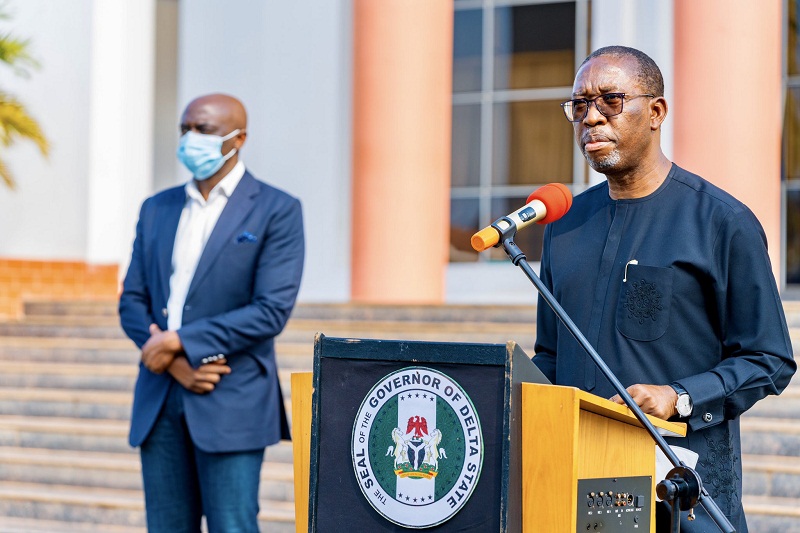 Delta Governor, Senator Dr. Ifeanyi Okowa (right), making a statewide broadcast to Deltans on Thursday, 22nd October 2020 at Government House Asaba