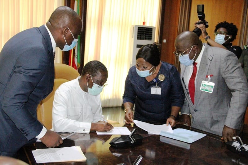 Delta Governor, Senator Dr. Ifeanyi Okowa (2nd left)); Speaker, Delta State House of Assembly, Rt. Hon. Sheriff Oborevwori (right); Attorney-General and Commissioner for Justice, Barr. Peter Mrakpor (left) and Clerk of the House, Barr. (Mrs.) Lyna Ocholor, during the signing of the 2021 Appropriation Bill into Law by the Governor in Government House ,Asaba. Monday, November 30, 2020 (Pix: Jibunor Samuel)